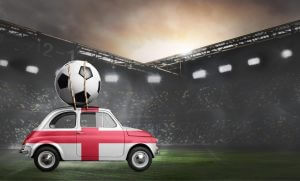england car delivering football to stadium
